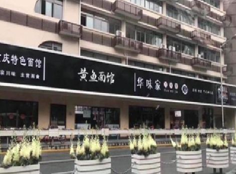 冷水江政府为什么要统一规划店铺招牌？